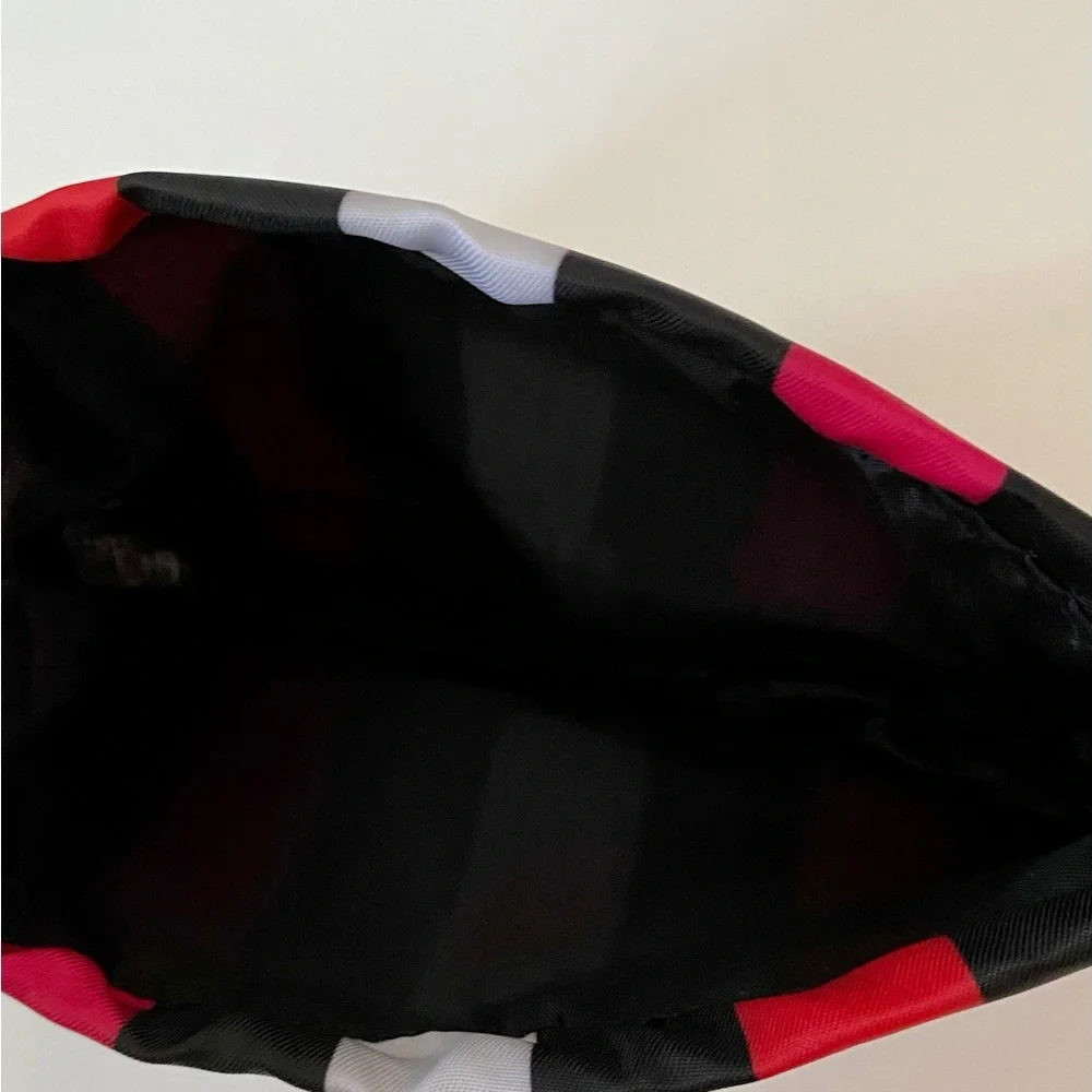 NWOT VICTORIA’S SECRET PINK AND RED STRIPED WATERPROOF COSMETIC BAG💗